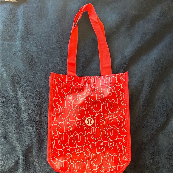 lululemon athletica Handbags - Lululemon Athletica Red Shopping Tote Bag